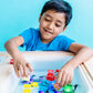 Boy_playing_with_Glo_Pal_Character_in_sensory_tub